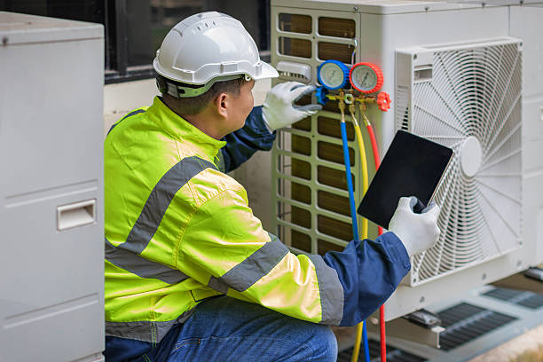 Professional Heat Pump Repair technician working in New Caney, TX